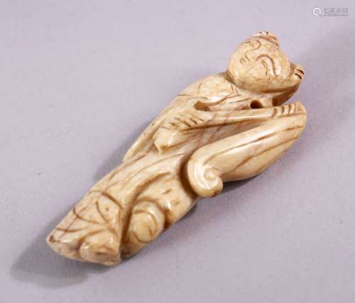 A SMALL 19TH CENTURY CHINESE SOAPSTONE NETSUKE OF A MAN, 7cm.