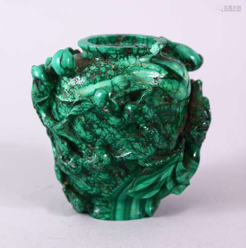 A 19TH CENTURY CHINESE MALACHITE SNUFF BOTTLE, carved with flowers and birds, 6cm.