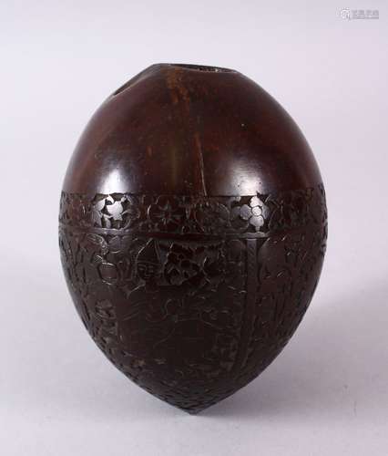 AN UNUSUAL CARVED COCONUT HUQQA, carved with figures on horseback, 14cm high.