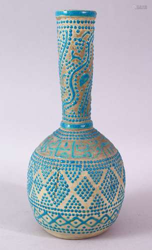 AN UNUSUAL ISLAMIC POTTERY VASE with turquoise beaded and calligraphic decoration, 27cm high.