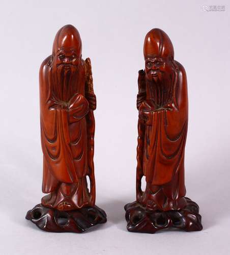 A PAIR OF 19TH CENTURY CHINESE CARVED BOXWOOD FIGURES OF SHOU LAO, the figures possibly boxwood,