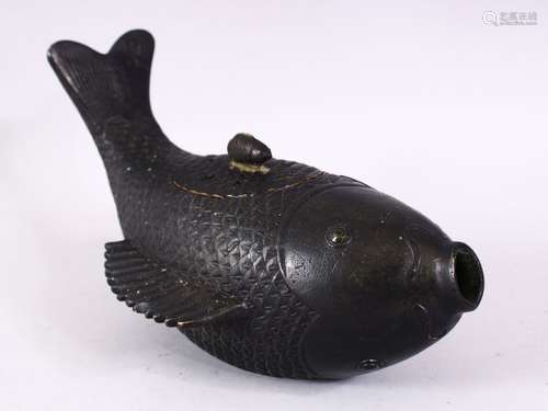 A CHINESE BRONZE CARP FORMED TEA POT, in the form of a flipping fish, with a cover and small carp