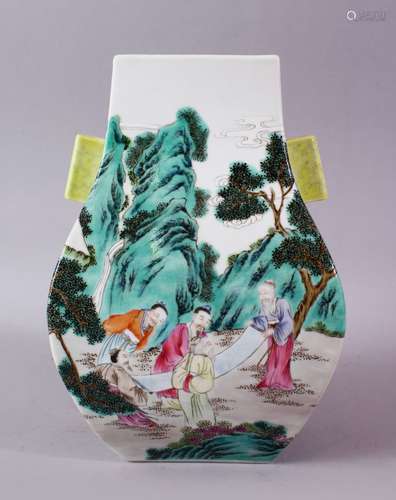 A CHINESE FAMIILE ROSE PORCELAIN HU SHAPED TWIN HANDLE IMMORTAL VASE, decorated with scene of