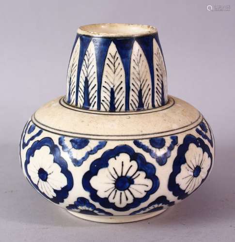 A SMALL ISLAMIC POTTERY VASE, of squat form painted with feather and flower motifs, 11cm high.