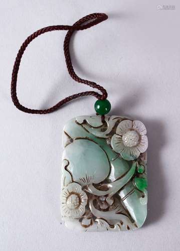 A 19TH/20TH CENTURY CHINESE CARVED JADE / JADEITE PENDANT, depicting a peach, prunus and bamboo, 5.