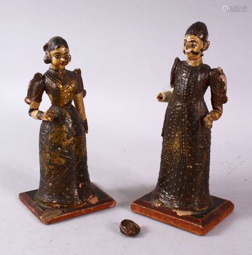 TWO PERSIAN LACQUERED WOOD FIGURES, (AF), 18.5cm high.