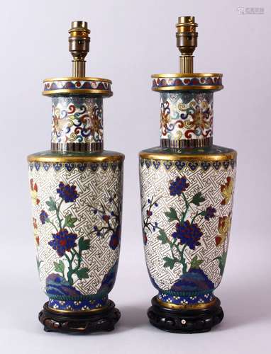 A PAIR OF 19TH CENTURY CHINESE CLOISONNE VASES / LAMPS, the bodies with formal lotus decoration