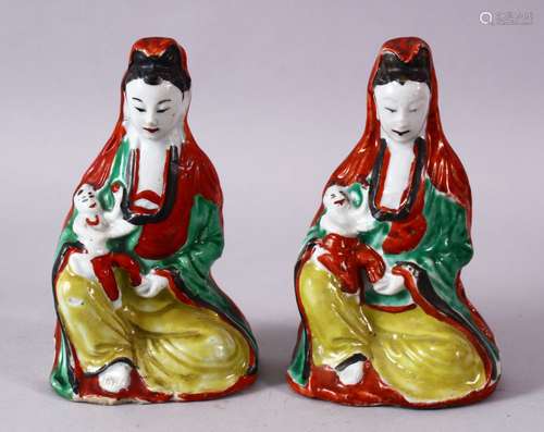 A PAIR OF 19TH CENTURY CHINESE FAMILLE VERTE POTTERY FIGURES OF GUANYIN, 15cm high.