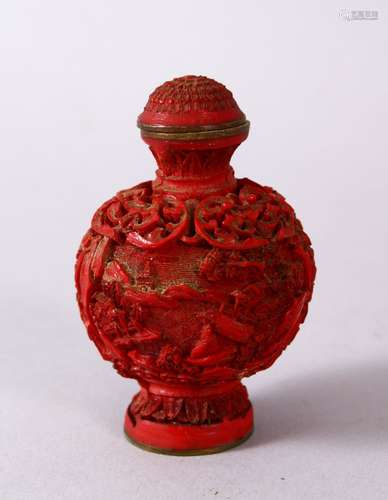 A 19TH / 20TH CENTURY CHINESE CINNABAR LACQUER SNUFF BOTTLE, The body carved depicting figures in