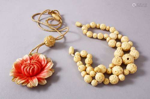 TWO CHINESE 19TH CENTURY CARVED IVORY ITEMS, One necklace carved and stained in floral style, with a