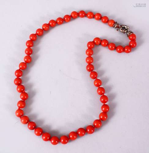 A 19TH / 20TH CENTURY CHINESE CARVED CORAL NECKLACE, Comprising 49 carved beads, approx 60gms,