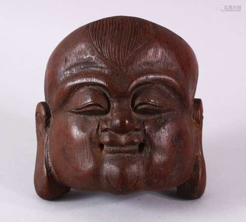 A 19TH / 20TH CENTURY CHINESE CARVED BAMBOO MASK OF BUDDHA, carved in the form of Buddha's face,