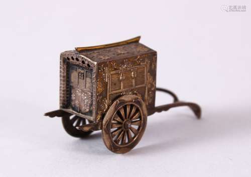 A 19TH CENTURY JAPANESE GILT SILVER SALT SHAKER in the form of a rickshaw, with moulded decoration