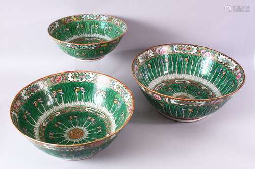 THREE 19TH/20TH CENTURY CHINESE PORCELAIN CANTON BOWLS, decorated with butterflies, flora and