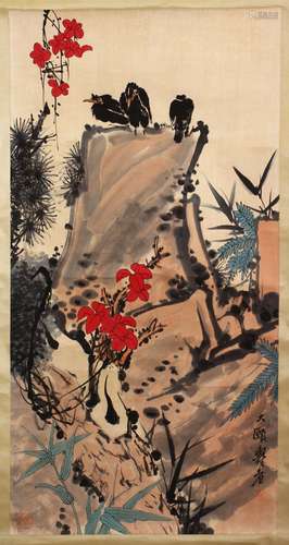 A CHINESE PAINTED SCROLL OF EAGLES UPON ROCKY OUTCROPS, the birds seated upon rocks in a