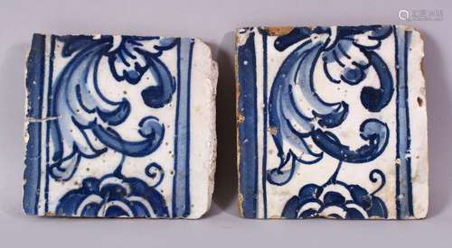 TWO 19TH CENTURY PERSIAN POTTERY TILES, painted in blue with a foliate design, 15cm x 14cm.