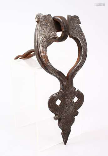 A 17TH / 18TH CENTURY PERSIAN SAFAVID STEEL DOOR KNOCKER, with calligraphy, 24cm.