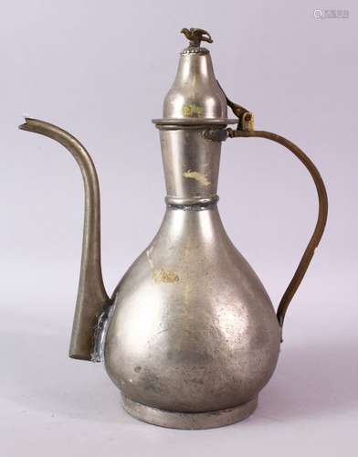 AN EARLY 20TH CENTURY PERSIAN EWER, hinged cover with bird finial, 30cm high.