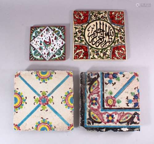 TWO 19TH CENTURY TILES with floral decoration and two later tiles, largest 21cm x 21cm.