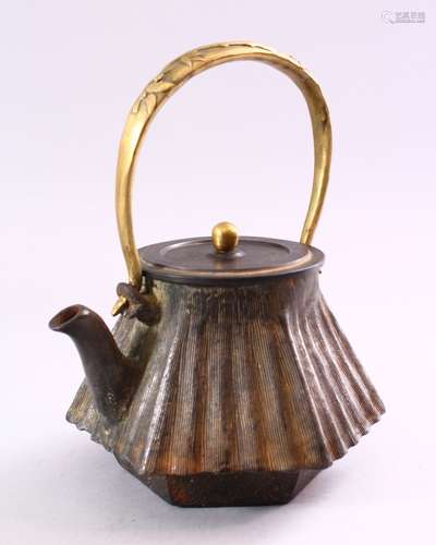 A FINE JAPANESE EDO / MEIJI PERIOD IRON KETTLE & COVER, the kettle with a bronze moulded handle of