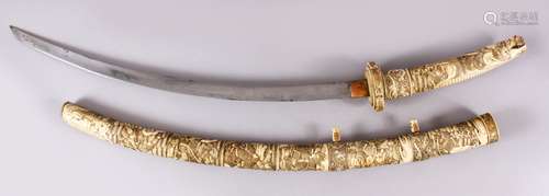 A LARGE JAPANESE MEIJI PERIOD CARVED SECTIONAL IVORY KATANA / SWORD, carved to depict an array of