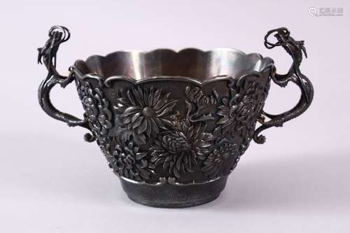 A JAPANESE MEIJI PERIOD SOILID SILVER DRAGON & CHRYSANTHEMUM PRESENTATION BOWL, the body of the