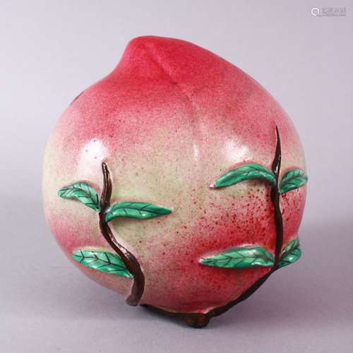 AN UNUSUAL 19TH CENTURY OR EARLIER CHINESE FAMILLE ROSE PORCELAIN MODEL OF A PEACH, the peach with a