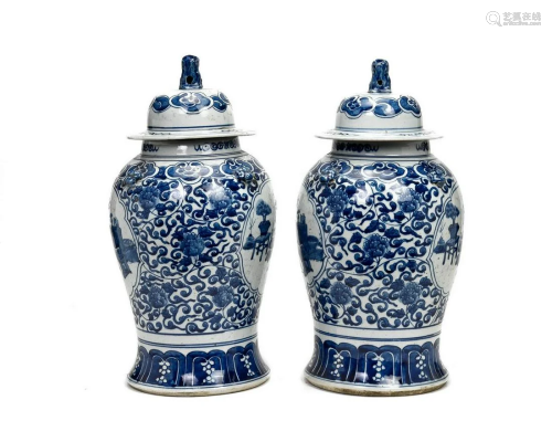 PAIR OF CHINESE BLUE AND WHITE JARS WITH LION LIDS