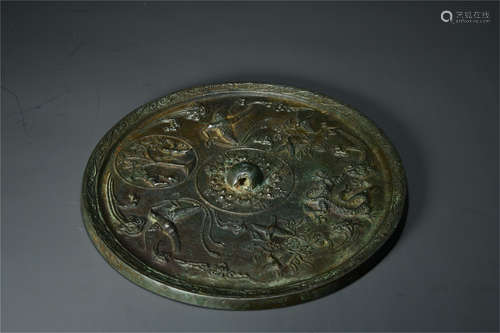 A Chinese Bronze Mirror