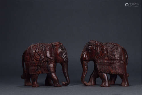 A Pair of Chinese Carved Hardwood Decorations