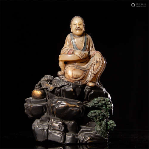 A Chinese Carved Stone Figure of Buddha