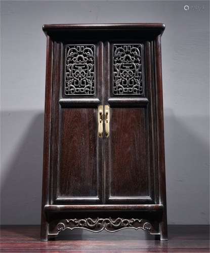 A Chinese Carved Hardwood Cabinet