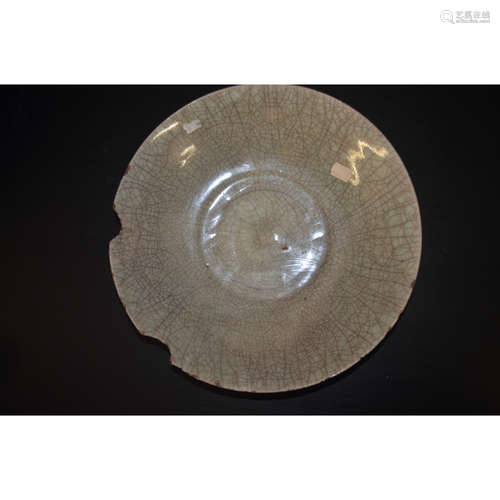 A Chinese Carved Celadon Dish