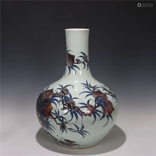 a large chinese blue and white copper red bottle vase