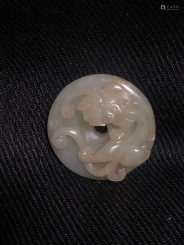 a chinese white jade dragon bi