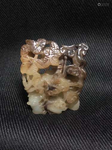 a chinese white jade carving of a hill