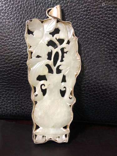 a chinese white jade flower pendant