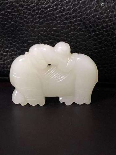 a chinese white jade carving of an animal