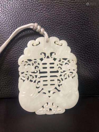 a chinese white jade carving pendant