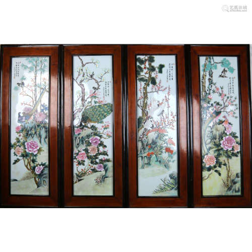 a set of four famille rose porcelain plaques