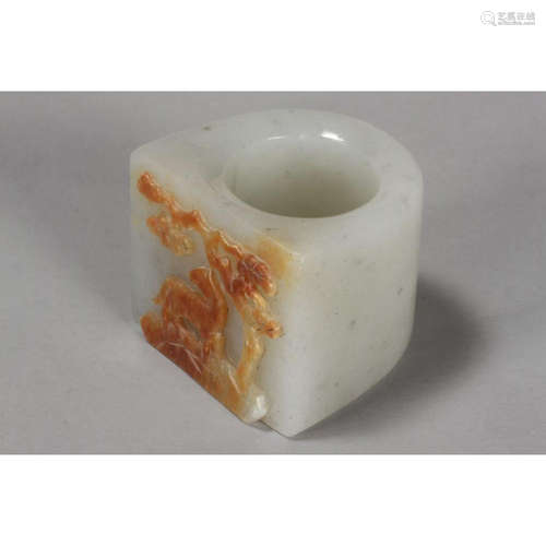 a chinese white jade with silk finger ring