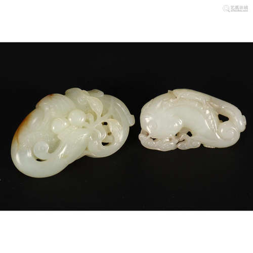 two chinese jade carvings of different sizes