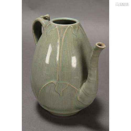 a chinese celadon glaze lotus tea pot