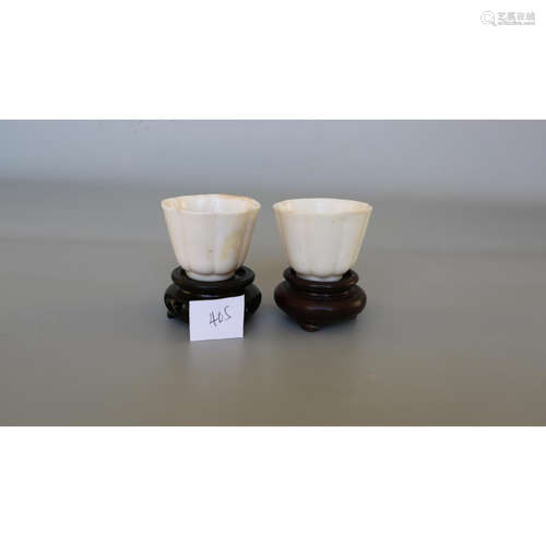 a pair of chinese white glaze cus