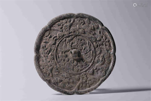 A Chinese Bronze Mirror