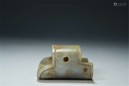 A Chinese Carved Jade Thumb Ring