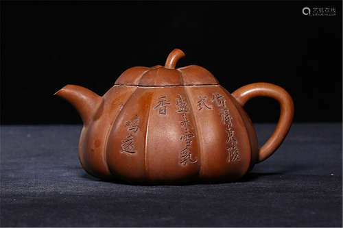 A Chinese Carved Yixing Clay Teapot