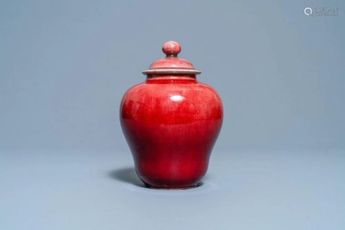 A Chinese monochrome copper red vase and cover,