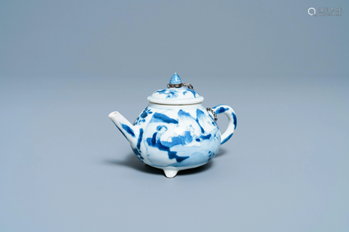 A Chinese blue and white tripod teapot with figures in