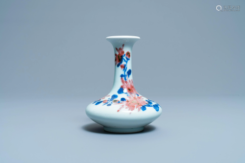 A small Chinese blue, white and underglaze red bottle